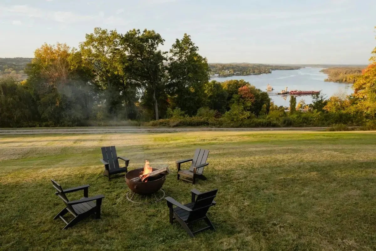 Fire pit with luxury seating at sunset. Caldora Living
